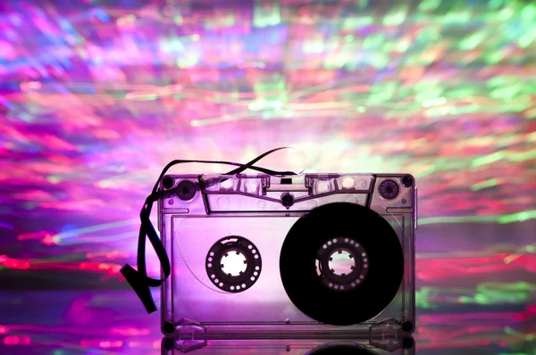 Cassette tape and multicolored lights — Stock Photo, Image