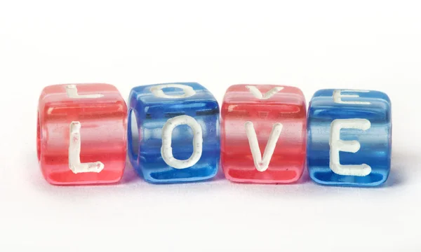 Texto Amor em cubos coloridos — Fotografia de Stock