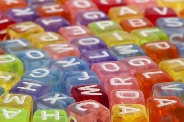 Kleurrijke kubussen met letters — Stockfoto