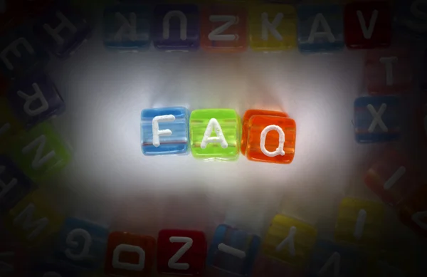 Text FAQ on colorful cubes — Stock Photo, Image