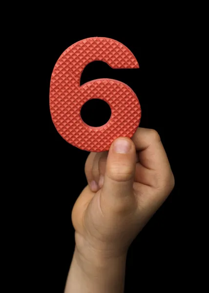 Children hand holding the number Six — Stock Photo, Image