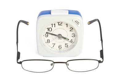 Alarm clock and glasses clipart