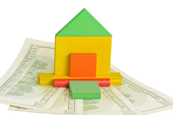 stock image Model of house and dollars