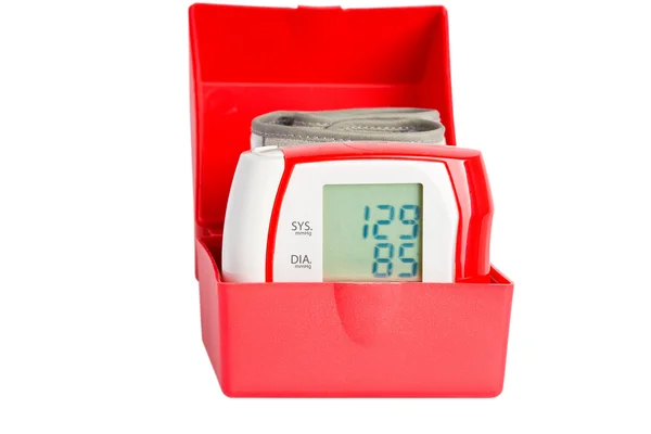 Manômetro vermelho em uma caixa — Fotografia de Stock