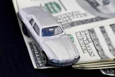 Car and hundred dollar bills clipart