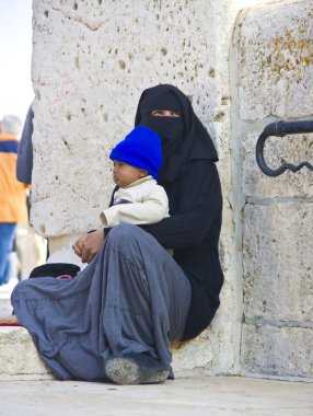 Female beggar on the Temple Mount, Jerusalem clipart