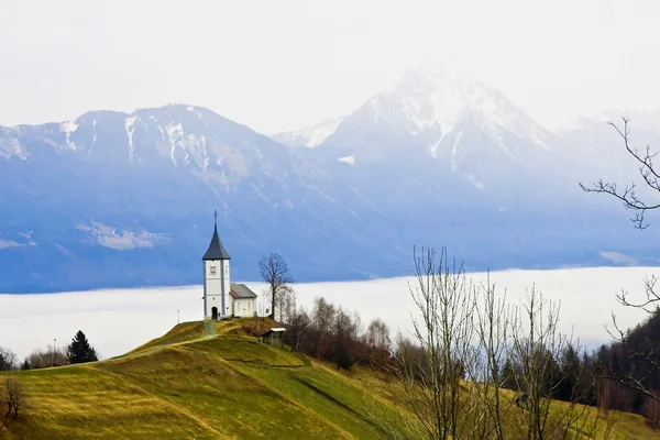 stock image Mountain view with village church