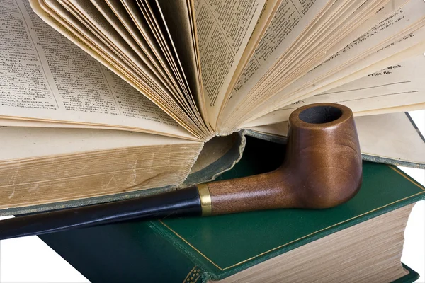 Two old books and a pipe — Stock Photo, Image