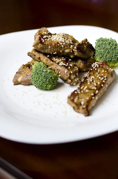 Stock image Baked pork ribs on a white plate