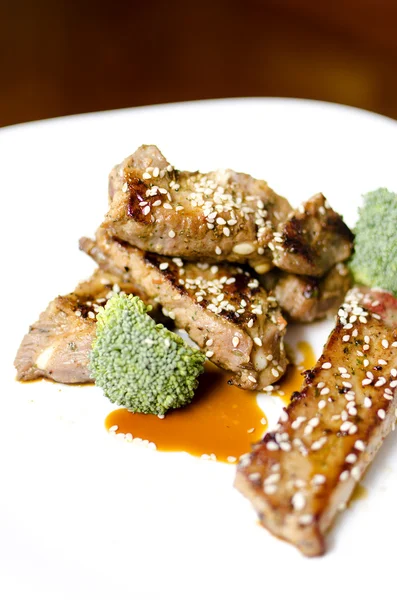 stock image Baked pork ribs on a white plate