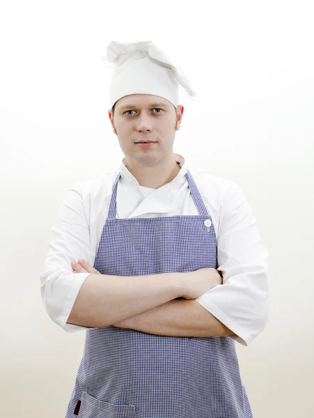 Портрет красивого шеф-повара со скрещенными руками — стоковое фото