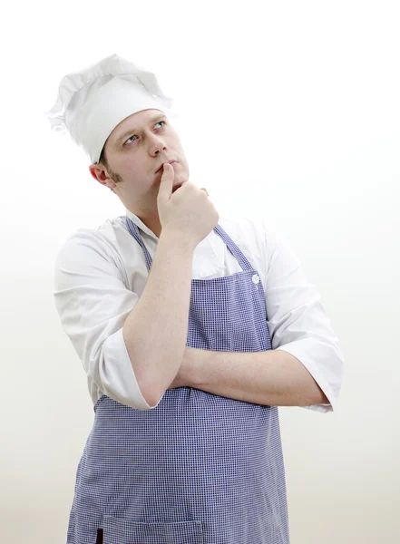 Porträt des denkenden Chefkochs — Stockfoto
