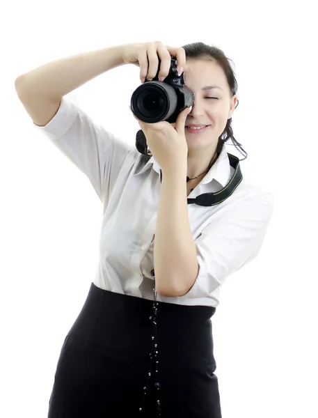 Młoda brunetka dziewczyna z aparatów fotograficznych na białym tle — Zdjęcie stockowe