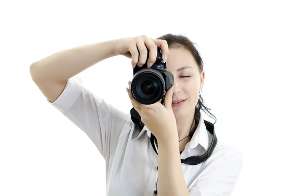 年轻黑发女孩与孤立在白色 photocamera — 图库照片