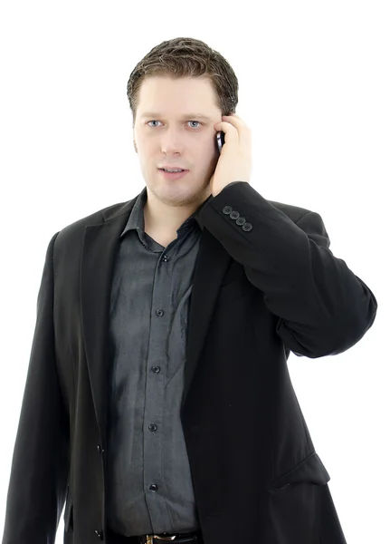 Portret przystojny młody biznesmen rozmowy na telefon komórkowy. na białym tle — Zdjęcie stockowe