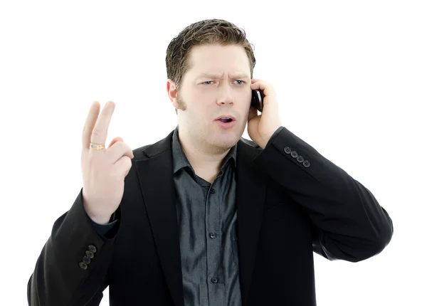 Retrato de un hombre de negocios joven y guapo hablando por teléfono móvil. Aislado —  Fotos de Stock