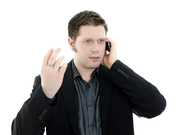 Portret van een knappe jonge zakenman praten op mobiele telefoon. geïsoleerd — Stockfoto