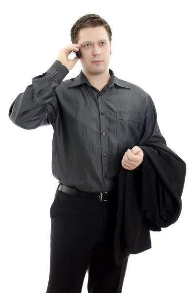 Porträt eines gut aussehenden jungen Geschäftsmannes, der mit dem Handy telefoniert. isoliert — Stockfoto