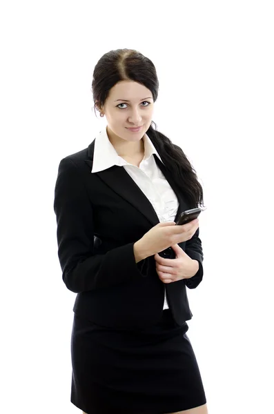 Portrait of a young attractive business woman with mobile phone. Isolated o — Stock Photo, Image