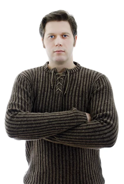 Uomo in maglione di lana con le braccia incrociate. Isolato su bianco . — Foto Stock