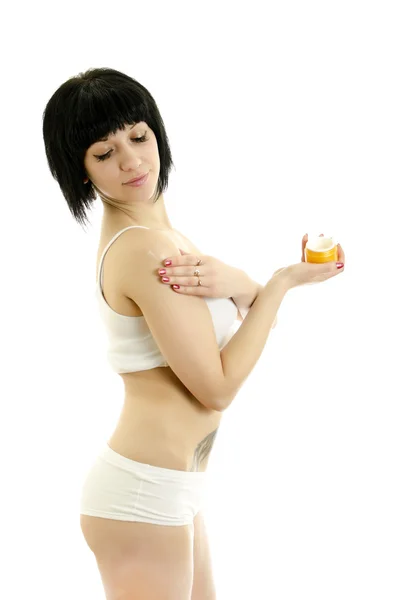Frau mit Körpercreme. isoliert auf weißem Hintergrund — Stockfoto