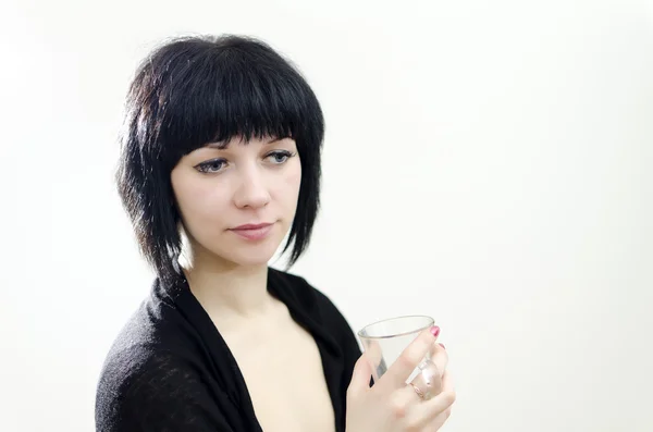 Portrait of brunette girl with glass. — Stock Photo, Image