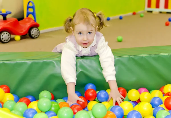 Little cute girl in playroom — Stok fotoğraf