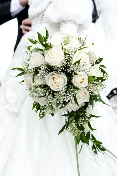 stock image Bridal bouquet of flowers in the hands of newlyweds