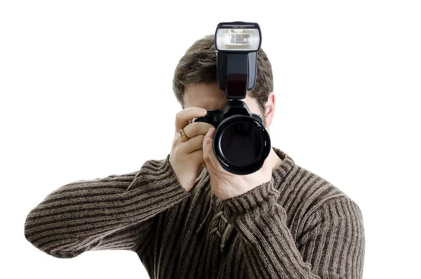 Fotoreportér hospodářství fotoaparát s bleskem. izolované na bílém. — Stock fotografie