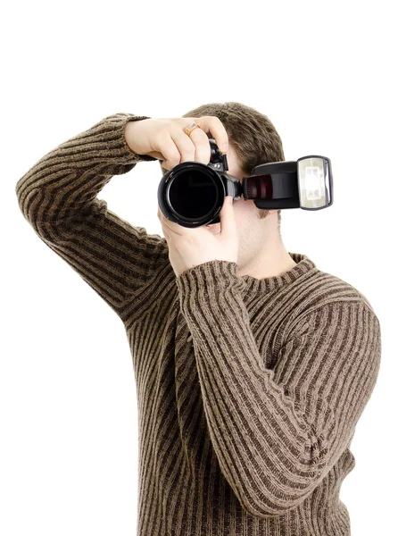 Foto muhabiri tutan fotoğraf makinesi ile birden parlamak. beyaz izole. — Stok fotoğraf