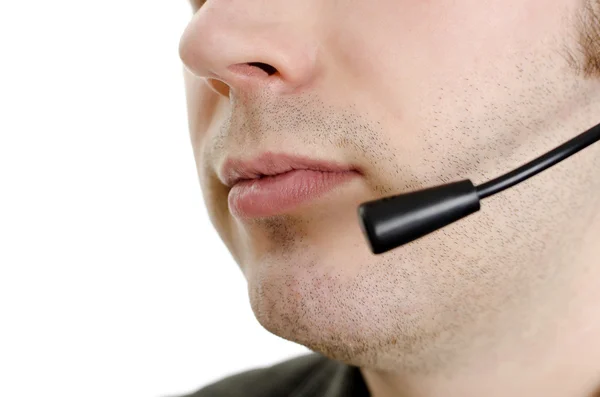 Close-up van operator's mond met microfoon. geïsoleerd op wit. — Stockfoto