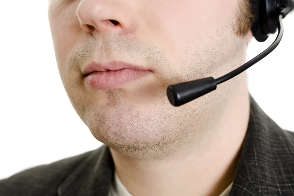 Closeup provozovatele ústa s mikrofonem. izolované na bílém. — Stock fotografie