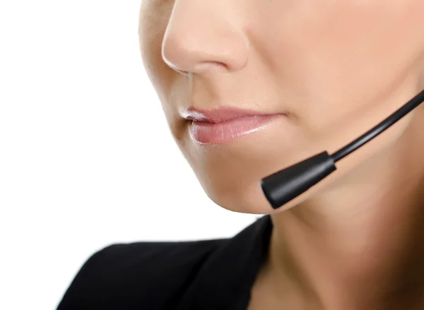 Vrouwelijke klantenondersteuning operator met hoofdtelefoon. deel van gezicht. geïsoleerd op wit. — Stockfoto