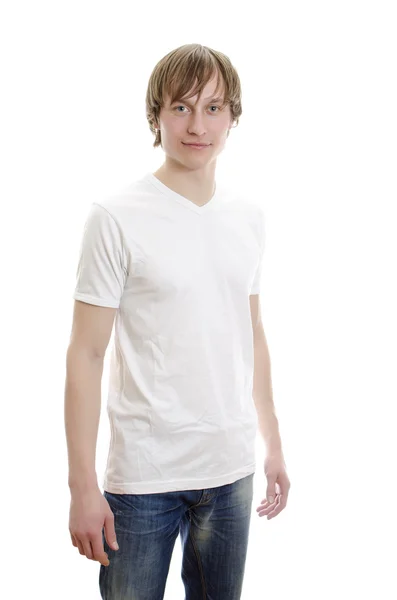 Lässiger junger Mann in weißem T-Shirt und Jeans. isoliert auf weiß. — Stockfoto