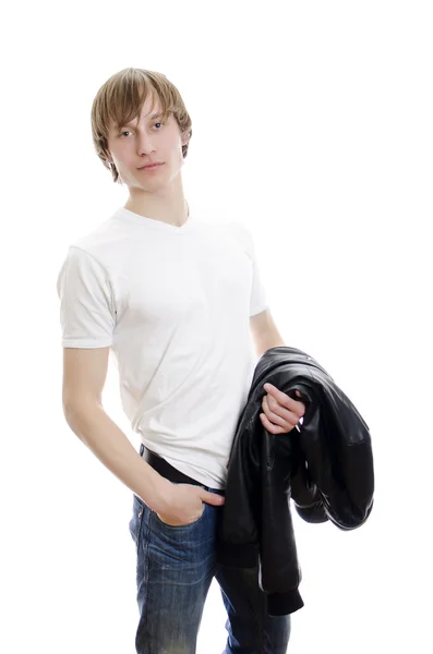 Casual young man in white t-shirt and leather jacket in hands. Isolated on white. — Stock Photo, Image