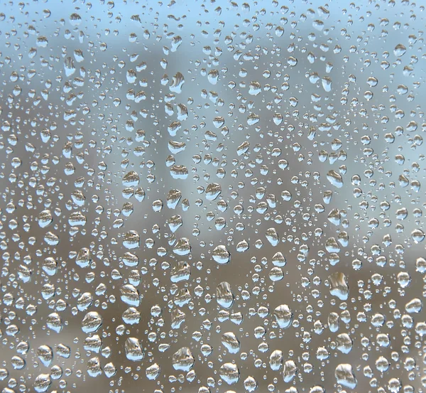 Wassertropfen auf Fensterscheiben. — Stockfoto
