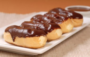 Delicious chocolate eclairs clipart