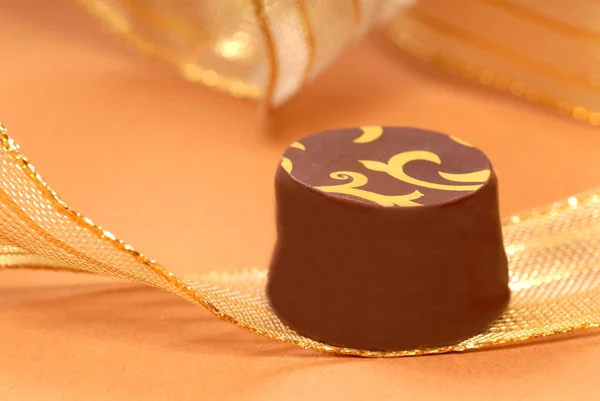 Delicious dark chocolate bonbon — Stock Photo, Image