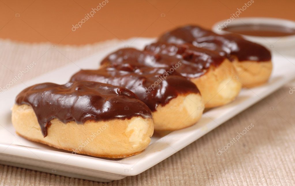 Delicious chocolate eclairs Stock Photo by ©HHLtDave5 8432624