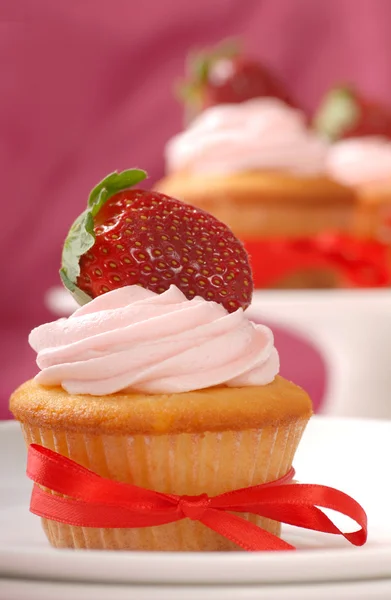 stock image Delicious Vanilla cupcake with strawberry frosting