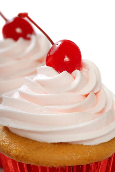Vanilla cupcake with maraschino frosting and cherry — Stock Photo, Image
