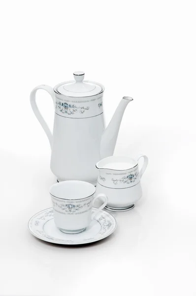 Cup and teapot — Stock Photo, Image