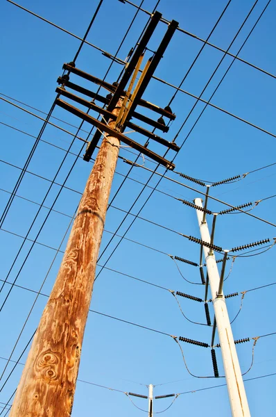 Wooden utility pole with power lines — Stock Photo, Image