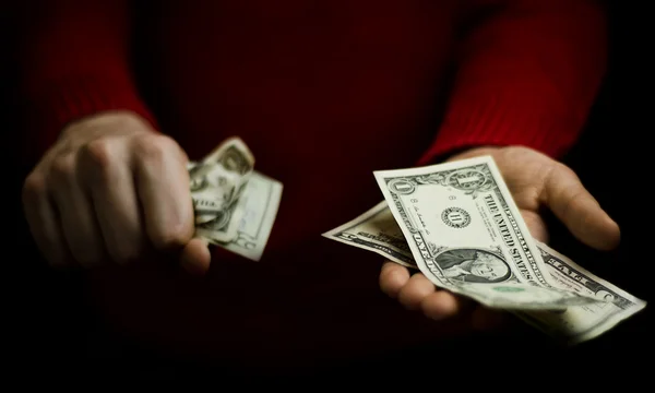 stock image Man holding money