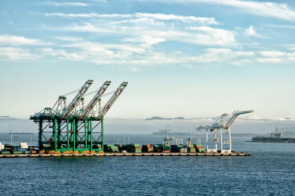 stock image Green cranes in the port