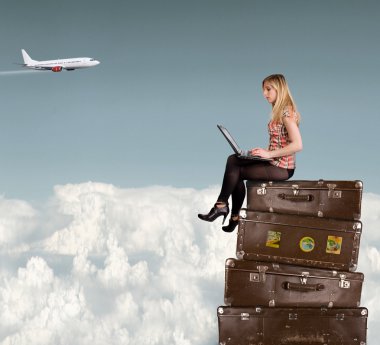 Beautiful blond woman on suitcases clipart