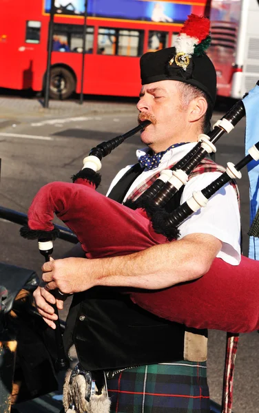 Bagpipe player — Stock Photo, Image