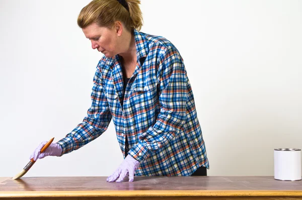 stock image Re-finishing a table