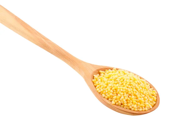 stock image Millet in a wooden spoon.