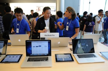 Sales person in Apple store clipart